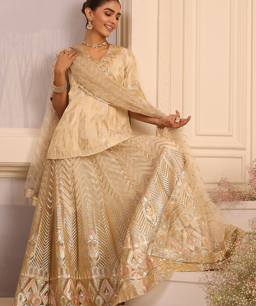 Beige Embroidered Peplum Lehenga Set